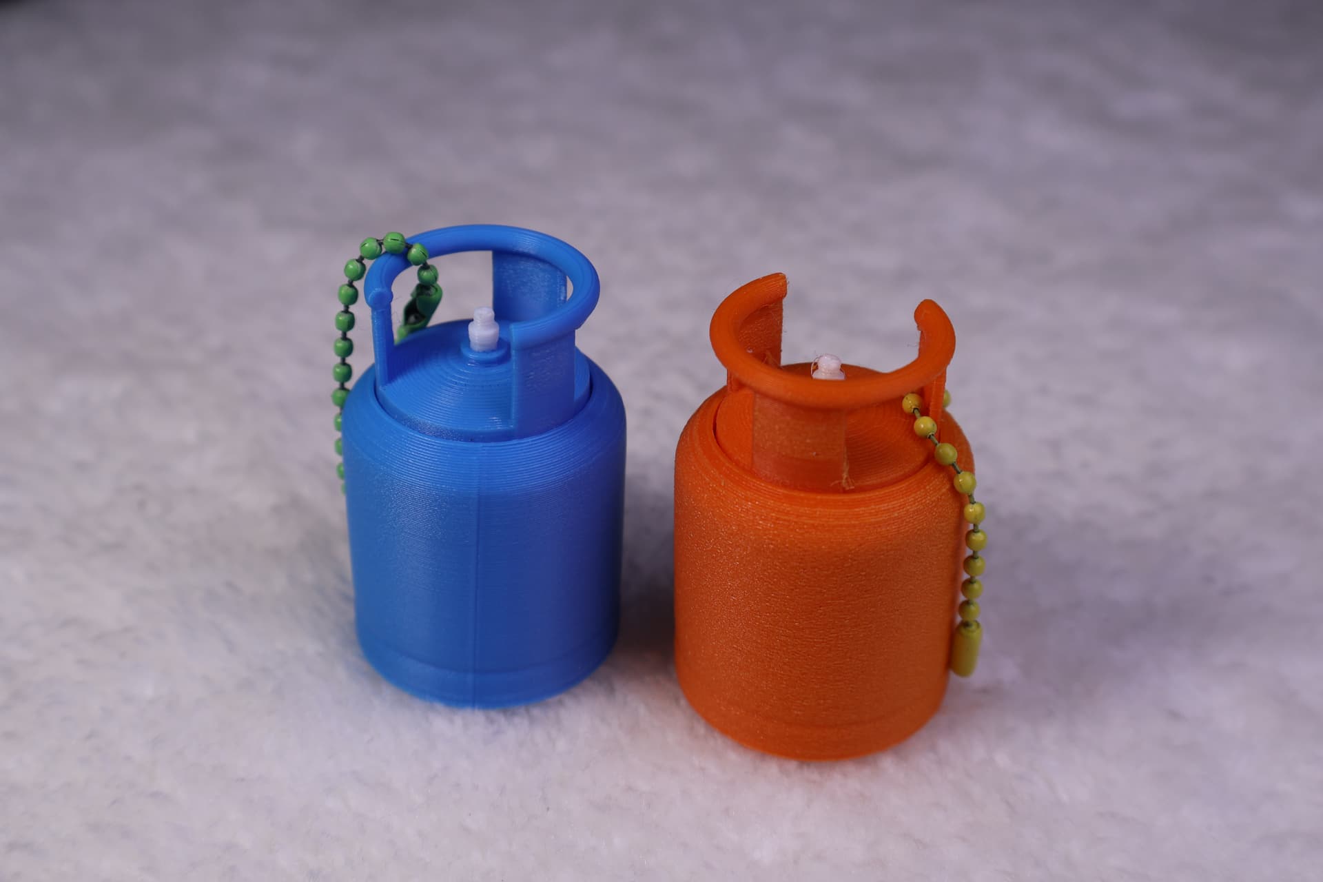 Blue and orange miniature 3D-printed keepsakes